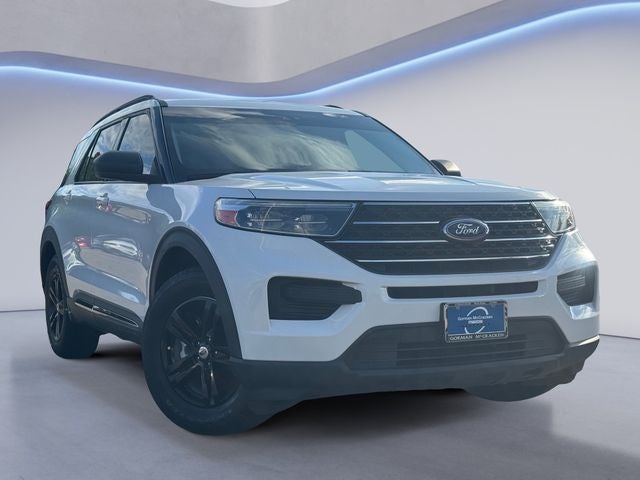 2021 Ford Explorer XLT in Oxford White — front three-quarter view