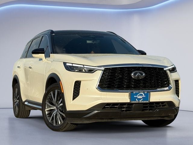 2024 INFINITI QX60 Autograph in Majestic White/Black Obsidian — front three-quarter view