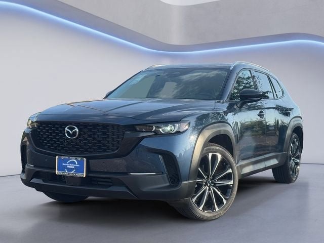 2026 Mazda Mazda CX-50 2.5 S Premium AWD in Ingot Blue Metallic — front three-quarter view